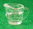 HR54327 - Measuring Cup, Filled with Water