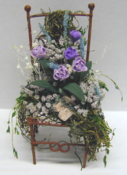 NCRP1132 - Iron Chair/Floral Arrangement
