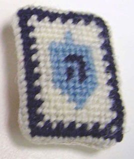 BYBJC5A - Dreidel Needlepoint Pillow